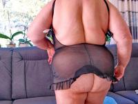 Chubby granny Marie Theres shows her big saggy tits & ass while changing - Photo #14