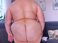 Chubby granny Marie Theres shows her big saggy tits & ass while changing - Photo #17