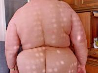 Chubby granny Marie Theres shows her big saggy tits & ass while changing - Photo #19