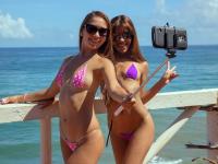 Lola Banny and her teen gf strip off string bikinis on oceanside patio - Photo #11