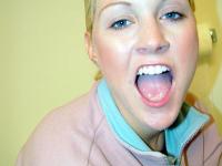 Horny white girl Jamie Woods sucks off a black cock via a gloryhole - Photo #20