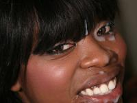 Ebony girl Angelica Wilson has interracial sex via a wall of gloryholes - Photo #21