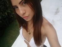 Sweet Latina Mily Mendoza exposes her adorable round ass and masturbates - Photo #1