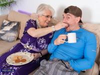 Fat blonde granny in glasses Caroline V gets pounded in a garter belt - Photo #2