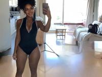 Cute ebony girl with an ass to die for sticks her tongue out in the nude - Photo #1