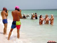Nude beaches girls enjoy outdoors in the ocean while being photographed - Photo #18