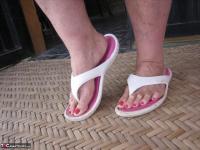 Old amateur Girdle Goddess exposes her obese body outside her front door - Photo #9