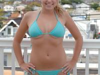 Luscious blonde Crystal flashing her natural boobs and bald pussy in public - Photo #1