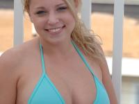 Luscious blonde Crystal flashing her natural boobs and bald pussy in public - Photo #2