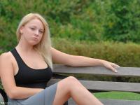 Luscious blonde Crystal flashing her natural boobs and bald pussy in public - Photo #14