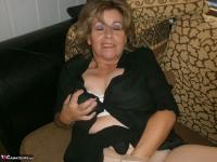 Old woman with large boobs pulls down pantyhose to finger her natural pussy - Photo #6