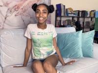 Skinny ebony babe flaunts her small breasts in a sexy bedroom striptease - Photo #1