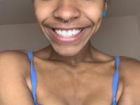 Skinny ebony babe flaunts her small breasts in a sexy bedroom striptease - Photo #8