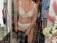 Old blonde woman strips to her underwear during a solo performance - Photo #16