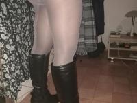 Hairy grandmother slides her upskirt panties aside to expose her vagina - Photo #1
