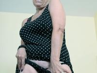 Sexy granny Savana flashes upskirt underwear before unleashing her large boobs - Photo #10