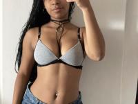 Ebony solo girl with a full head of curly hair models a lot of outfits - Photo #13