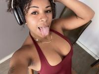 Ebony solo girl with a full head of curly hair models a lot of outfits - Photo #14