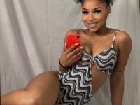 Ebony solo girl with a full head of curly hair models a lot of outfits - Photo #16