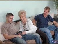Busty granny Mrs. Jewell got to please two cocks in steamy group action - Photo #2
