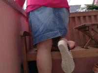 Horny oma spreads her upskirt pussy after pulling down her hose on patio - Photo #5