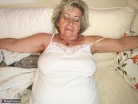 Horny grandmother slides hands down pantyhose to masturbate - Photo #13