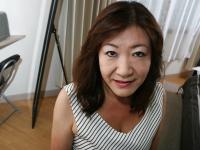 Asian granny Michiko Okawa undressing and exposing her hairy twat in close up - Photo #1