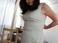 Asian granny Michiko Okawa undressing and exposing her hairy twat in close up - Photo #4