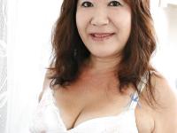 Asian granny Michiko Okawa undressing and exposing her hairy twat in close up - Photo #6