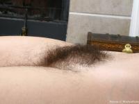 Sexy girl Raven shows her boobs and plays with her hairy cunt in nasty solo - Photo #16