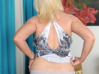 Busty Brazilian lady Angelique shows her curves & plays with her pussy lips - Photo #3