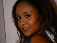 Black chick Octavia gives a blowjob at a gloryhole and takes a facial - Photo #4