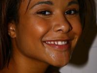 Black chick Octavia gives a blowjob at a gloryhole and takes a facial - Photo #19
