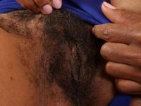 Ebon cougar Ariela shows off her super hairy holes and sensitive feet - Photo #3