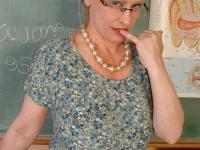 Mature teacher Lavender with big saggy tits gets naked in the classroom - Photo #1