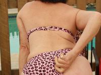 Dark-haired granny Mona strips poolside and shows her hairy holes - Photo #4
