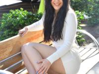 Cute amateur babe April flashes her tasty twat on an outdoor bench - Photo #6