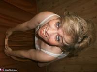 Naughty granny Caro wearing hot pantyhose on her mature hairy legs and pussy - Photo #13