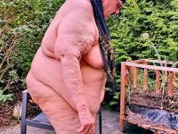 Morbidly obese old woman steps out onto a patio while totally naked - Photo #18