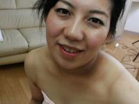 Lusty asian mature lady has some pussy fingering fun after bath - Photo #1