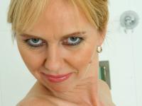 Mature amateur Elizabeth playing with her saggy breasts in the shower - Photo #20