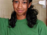 Tall ebony girl undresses before wetting her full bush in shower - Photo #1