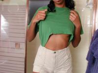 Tall ebony girl undresses before wetting her full bush in shower - Photo #4