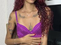Tattooed redhead works free of sexy lingerie during solo action - Photo #5