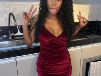 Cute ebony girl models a short red velvet dress as well as a black top and jeans - Photo #2