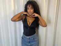 Cute ebony girl models a short red velvet dress as well as a black top and jeans - Photo #6