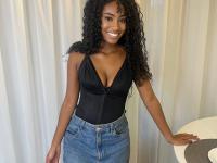 Cute ebony girl models a short red velvet dress as well as a black top and jeans - Photo #7
