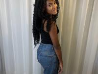 Cute ebony girl models a short red velvet dress as well as a black top and jeans - Photo #8