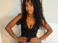 Cute ebony girl models a short red velvet dress as well as a black top and jeans - Photo #10