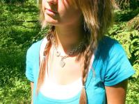 Cutie Britt Phillips in pigtails removing her top to sun her big titties - Photo #2